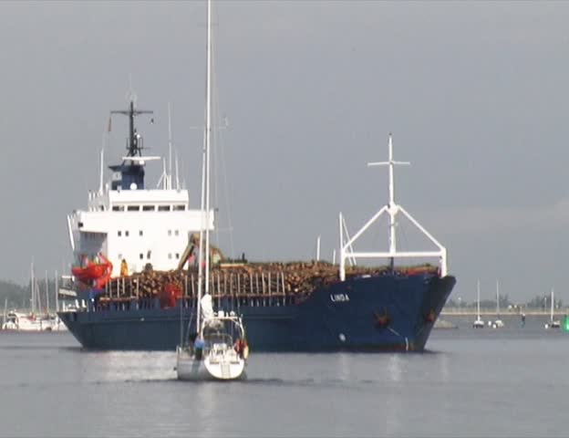 Freighter and Sailing boat