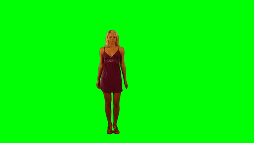 Sexy girl dancing over green background