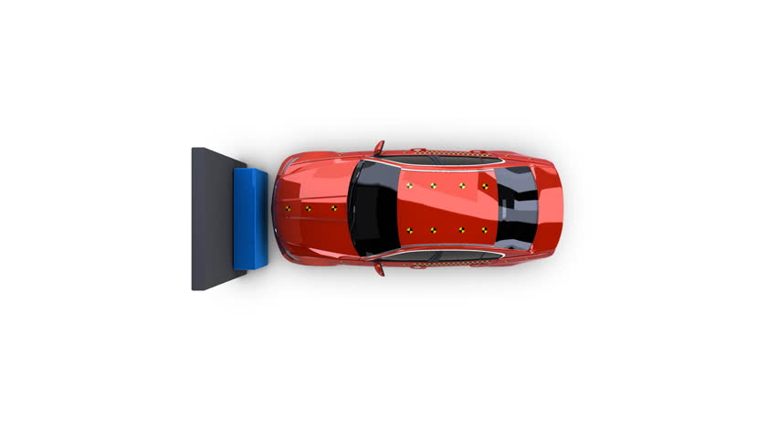 Top view of a car smashing into a wall during crash test 