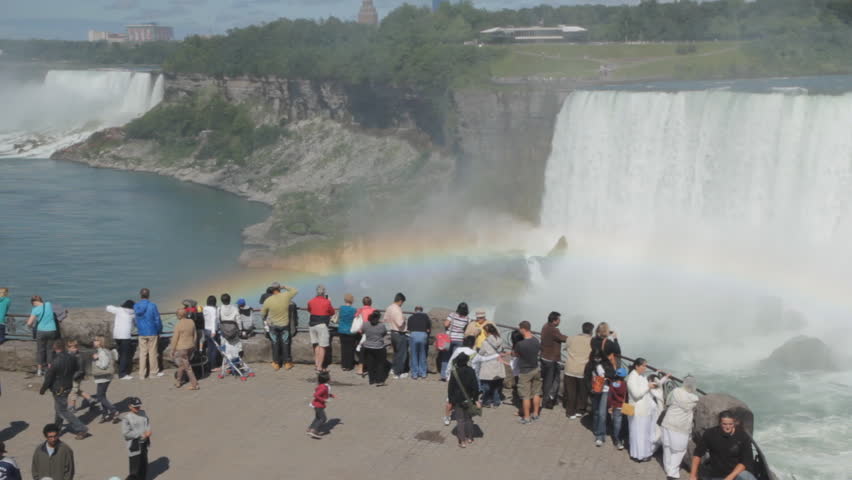 NIAGARA FALLS - JUNE 6th: Tourists at Niagara Falls, Ontario, Canada on June 6th, 2010. Increased US passport fees has reduced the numbers of US tourists visiting the Canadian side of Niagara Falls.