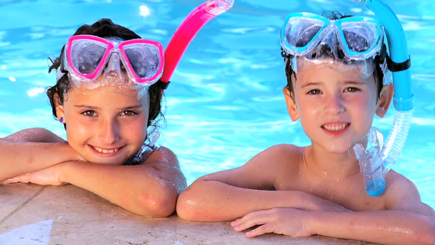 Young children having fun in their family swimming pool 60 FPS