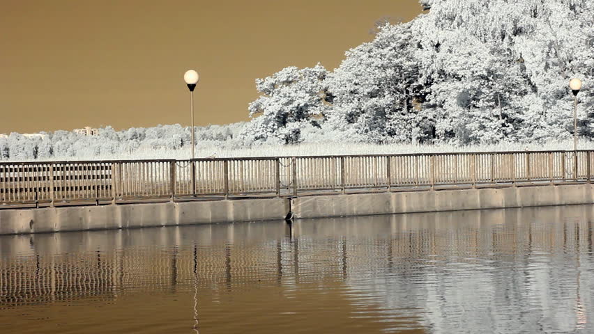 Infrared Finland: girl jogging on a bridge 1 