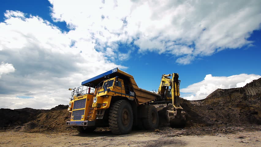 Off-road dump truck in the open pit mine
