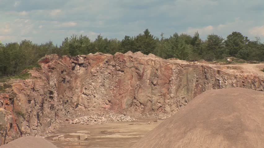 Miners set the explosion at the open pit quarry.