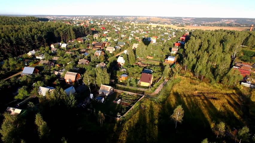 view from balloon of village and forest