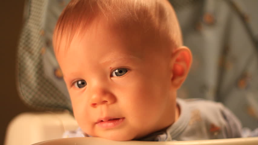 Incredibly cute baby boy close up Narrow DOF