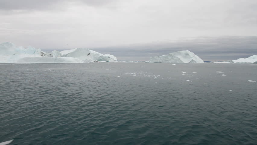 Sailing in the famous Ilulissat icefjord in Greenland. The icefjord is on UNESCO's World Heritage List.