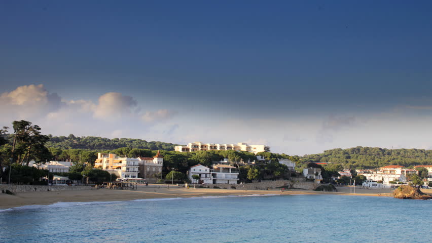 panning timelapse in late afternoon, across the bay of la fosca, costa brava, spain