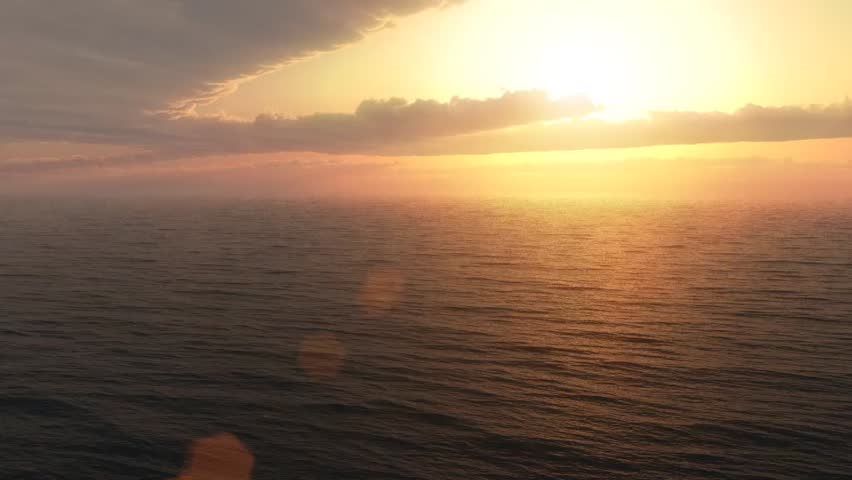 Camera flies between expansive ocean and large cloud layer at sunset.