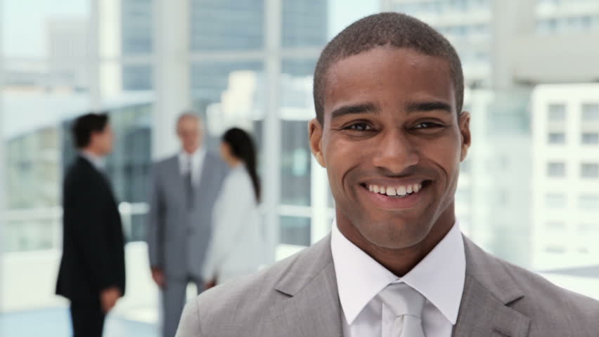 Handsome Businessman Portrait in an Office Lobby