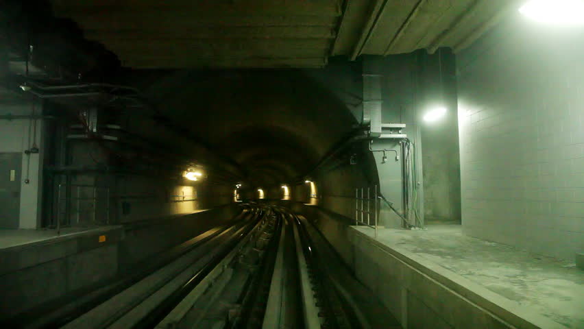 30sec time-lapse of underground train in the tunnel. Cab view. Sped up motion through the stations and underground facilities. 