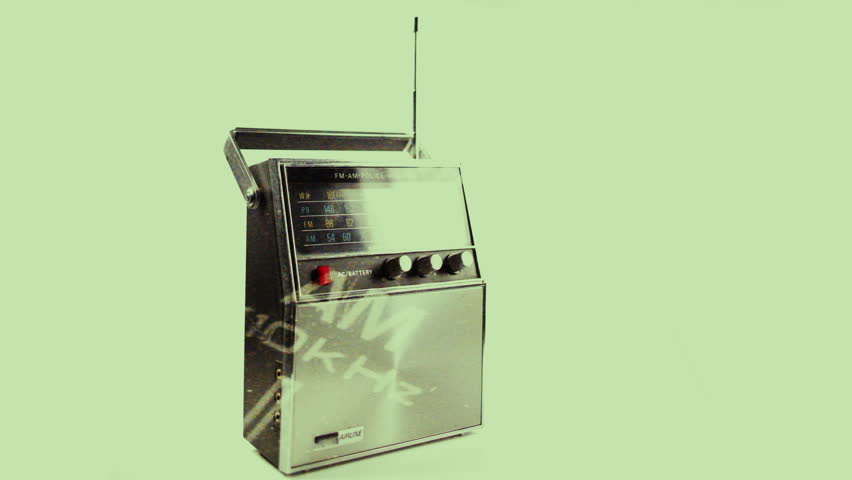 an analogue radio dial tuning in different radio frequencies