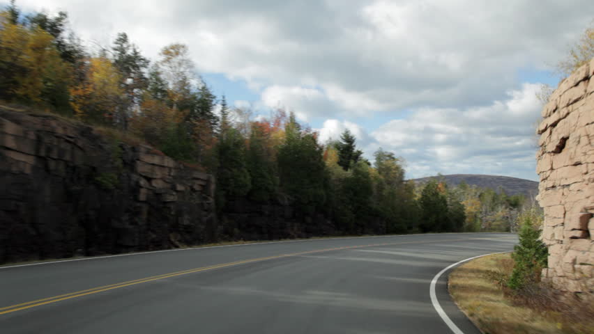 POV clip driving on Cadillac Mountain road (part of the Park Loop Road) in autumn in Acadia National Park.