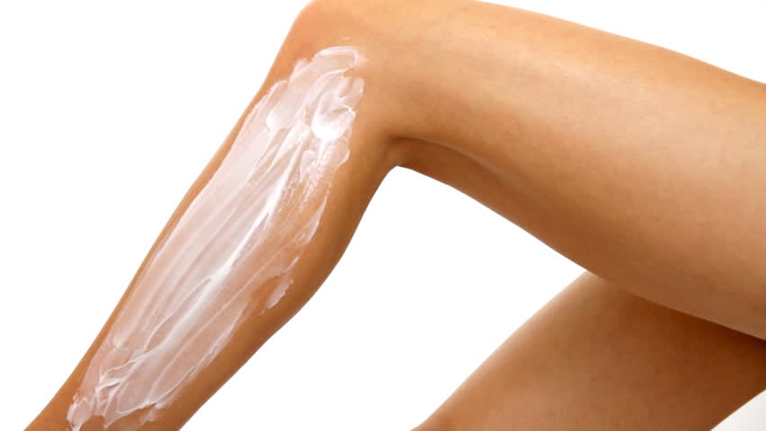Woman shaving leg