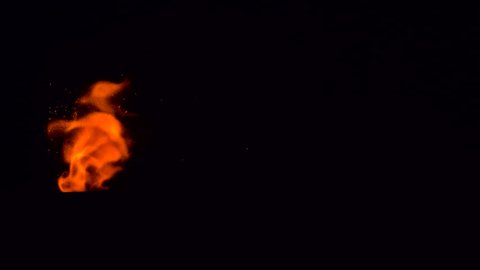 Burning Gunpowder. Gunpowder path ignites and burns with a bright flame on a black background