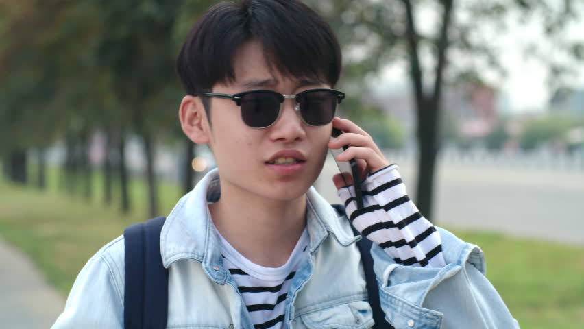 Teenage Asian Boy In Sunglasses Stock Footage Video 100
