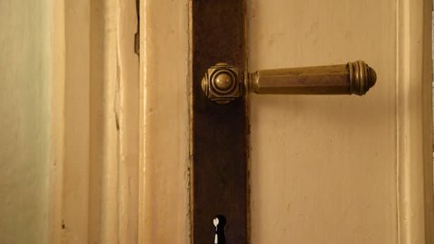 Young Man Unlocking A Deadbolt Stock Footage Video 100 Royalty
