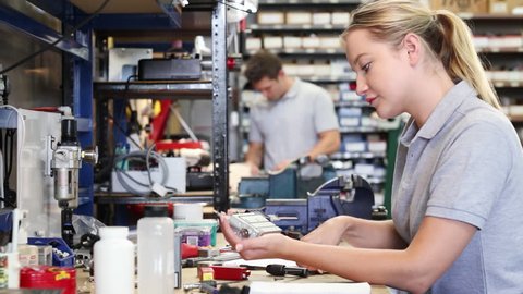 Female Engineer In Factory Measuring Stock Footage Video 100