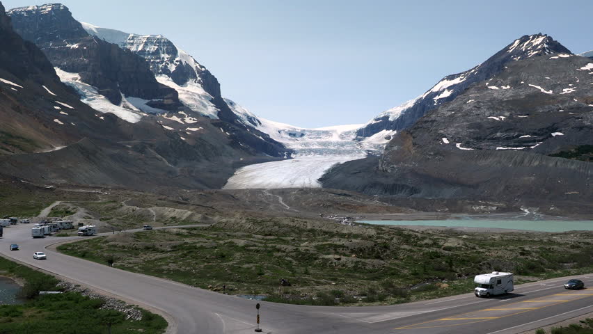 driving-on-the-road-into-the-mountains-in-banff-national-park-alberta