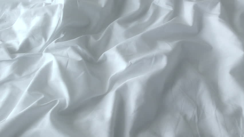 Crumpled White Bed Sheets. Background Stock Footage Video (100% Royalty