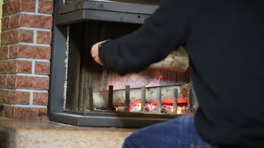 Young Man Opening Fireplace Glass Stock Footage Video 100