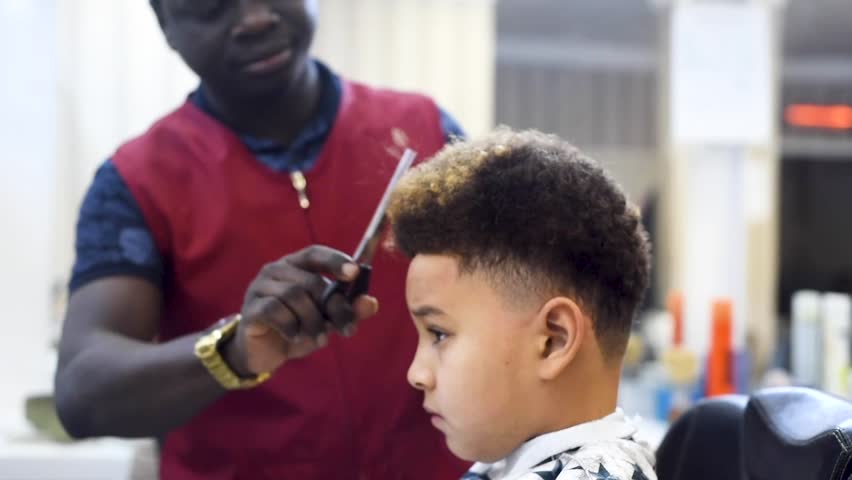 Boy In The African Barbershop Stock Footage Video 100 Royalty Free 1024339505 Shutterstock