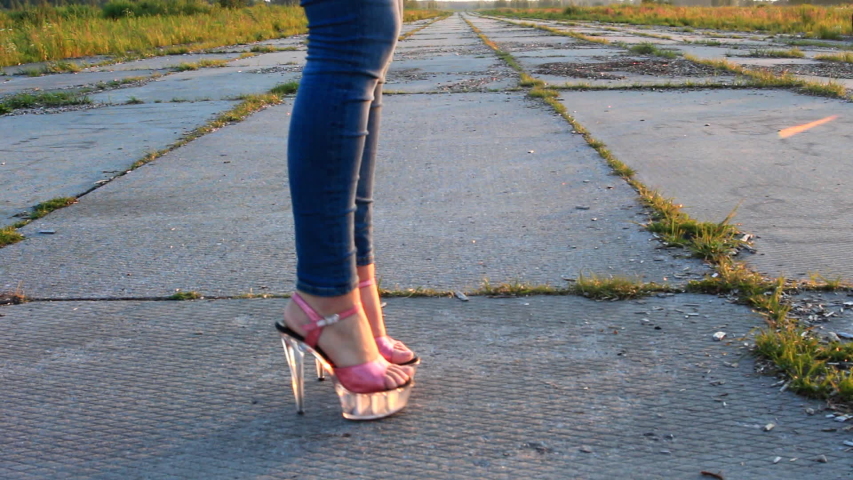 High heels walk. Walk Heels outside.