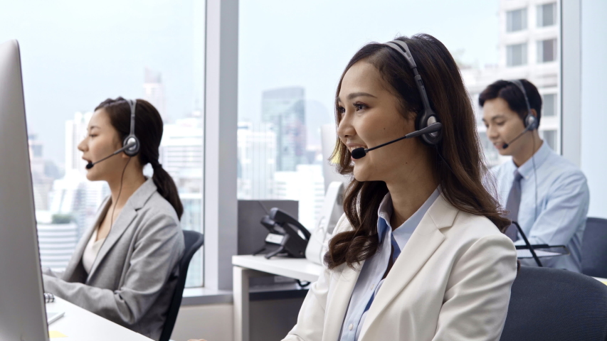 Woman wearing a microphone at the call center Image Free Stock Photo 