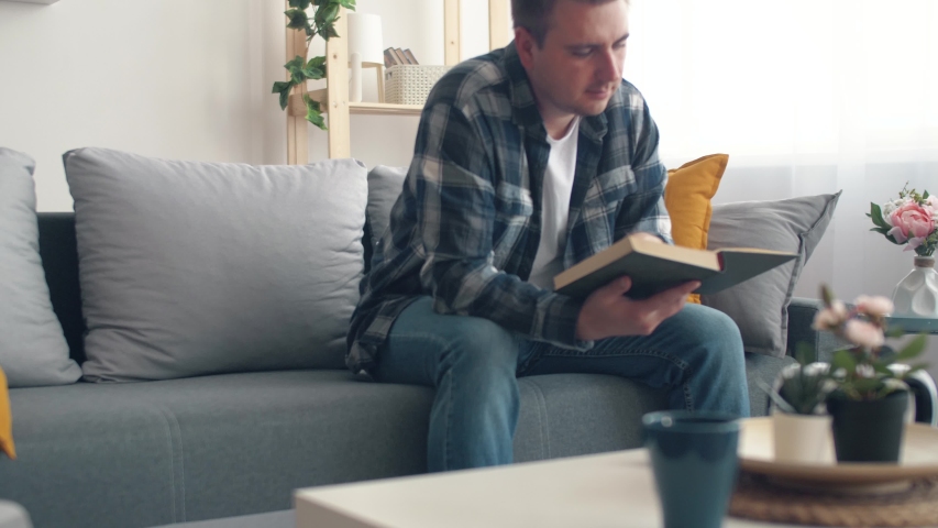 Man Lying On The Couch Stock Footage Video 100 Royalty Free