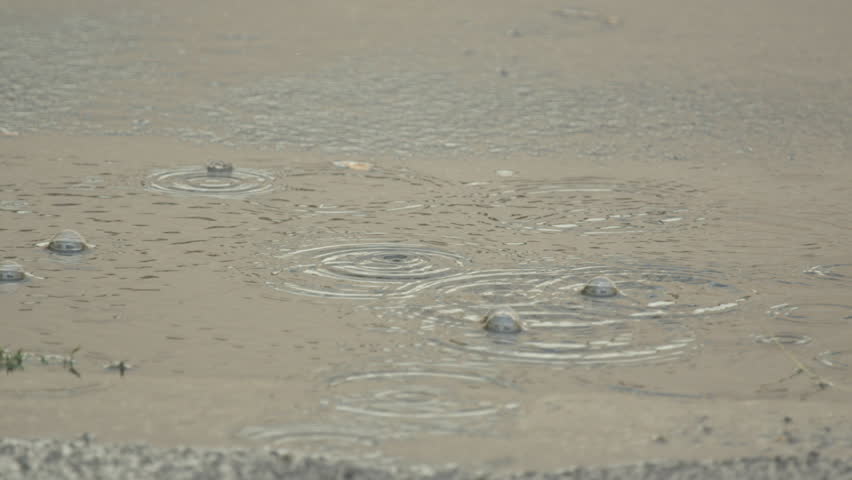 Stock video of slow motion close up: raindrops falling | 11925155 ...