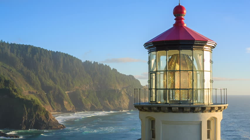 Along The Oregon Coast Stands The Heceta Head Lighthouse, Lit Up At ...