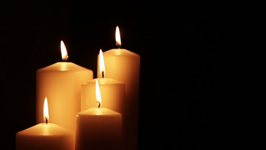 Footage Burning Candles Isolated On A Black Background. Hd Video Stock