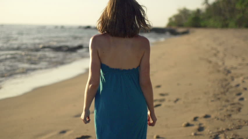 Young Woman Walking On Beach Stock Footage Video 1