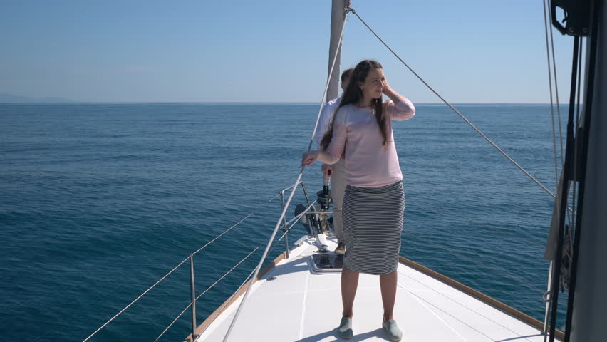 Healthy Retired Couple Having Fun Aboard Their Luxury Sailing Boat ...