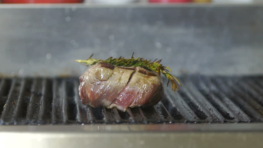 Restaurant Kitchen Video beef steak is grilling at restaurant kitchen stock footage video Restaurant Kitchen Video beef steak is grilling at restaurant kitchen stock footage video