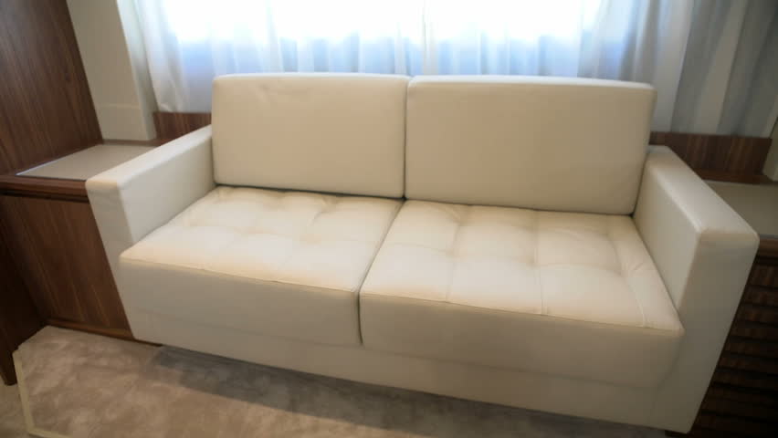 White Leather Sofa In Main Cabin On Luxury Yacht