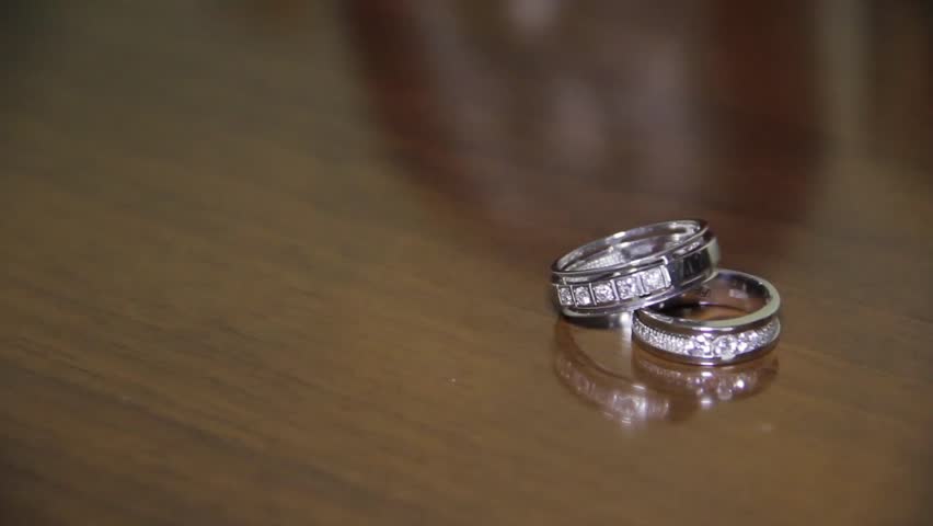 Stock Video Of Wedding Rings On Glossy Background 13036421 Wedding Rings On Glossy Backgroun