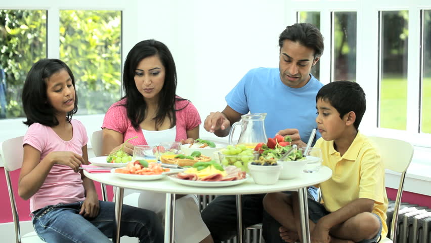 Asian Family Sitting At Table Eating Meal Together Stock Footage Video 6444695 Shutterstock Asian Family Sitting At Table Eating Meal Together Stock Footage Video 6444695 Shutterstock