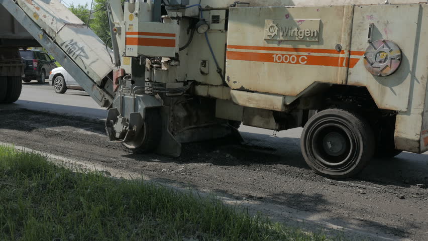 Road Asphalt Remain Dirt Load To Small Rv Bobcat Truck In Street Road Asphalt Remain Dirt Load To Small Rv Bobcat Truck In Street