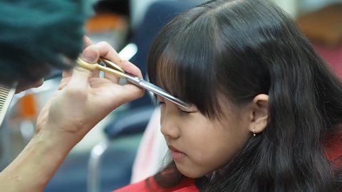 Little Asian Girl Getting Haircut Hair Stock Footage Video (100%  Royalty-free) 17366545 | Shutterstock