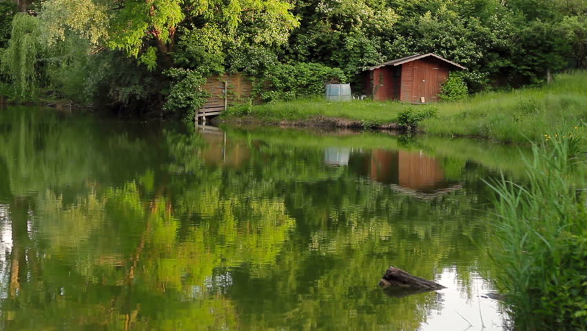 Log Cabin Next To Lake Stock Footage Video 100 Royalty Free