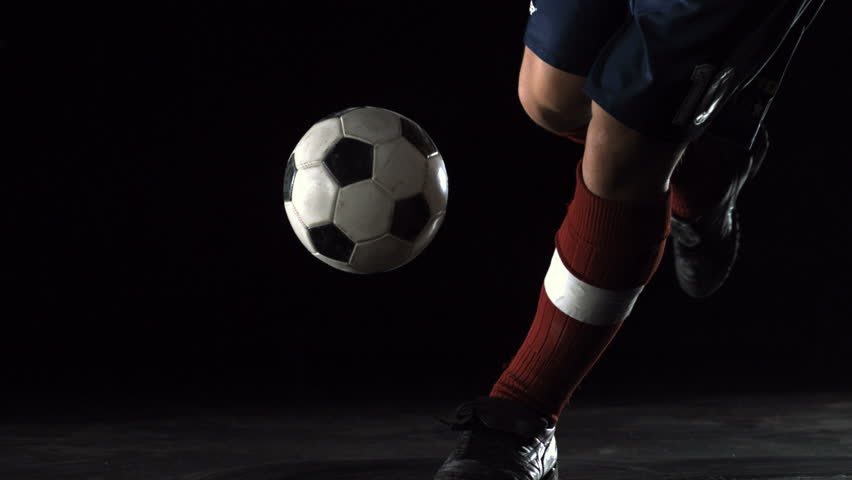 Detail Soccer Player Kicking Ball On Field Slow Motion Stock Footage