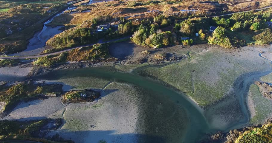  Ballyrisode beach, west Cork, Ireland. On the way to Mizen Head. The most beautiful beach in the country. White sand, crystal clear water, low tide, rocky islands. Bay bridge, just before the sunset.