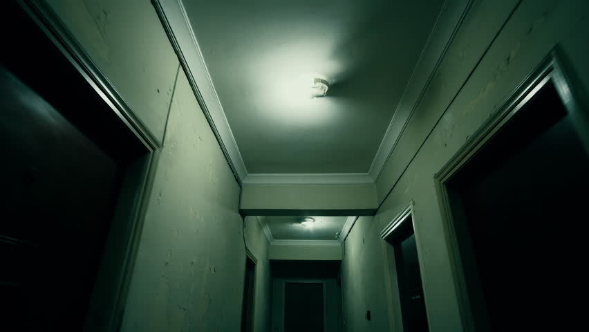 Apartment Building Hallway Lighting old apartment building,long dark hallway.tracking in on the Apartment Building Hallway Lighting old apartment building,long dark hallway.tracking in on the