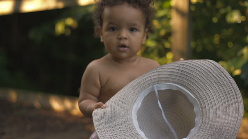 Hd00 06happy Little African American Child With Curly Hair In White