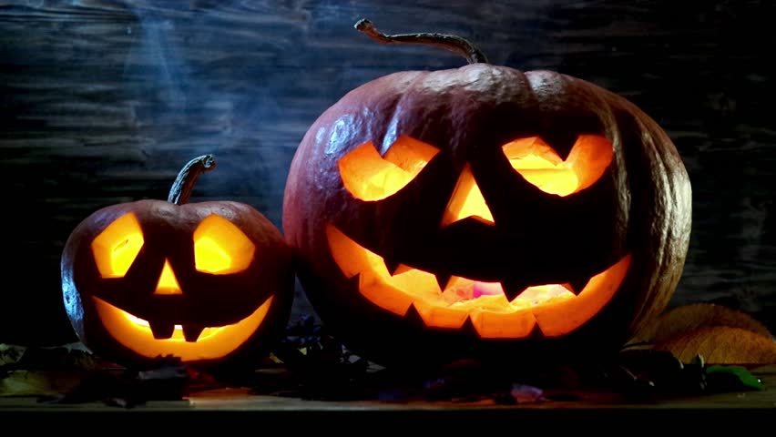 halloween pumpkins mysteriously illuminated from within hd stock video clip - Halloween Background Video halloween pumpkins mysteriously illuminated from within hd stock video clip - Halloween Background Video