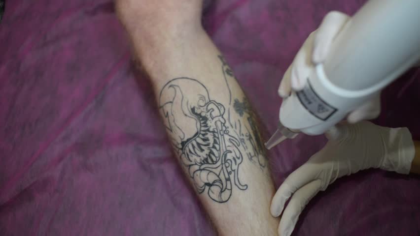 an indian lady does a henna tattoo on a hand stock footage video an indian lady does a henna tattoo on a hand stock footage video