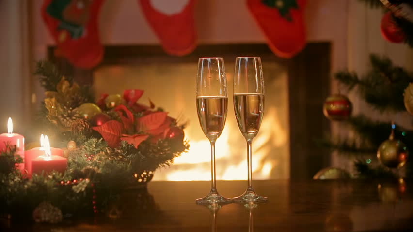 Dinner Table Background pouring champagne in two glasses on christmas dinner table Dinner Table Background pouring champagne in two glasses on christmas dinner table