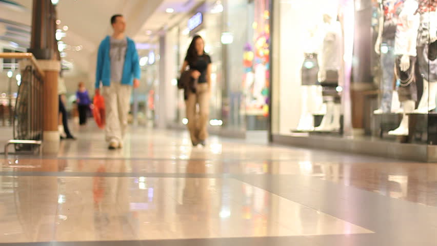 Slow Motion Of Shoppers In The Mall