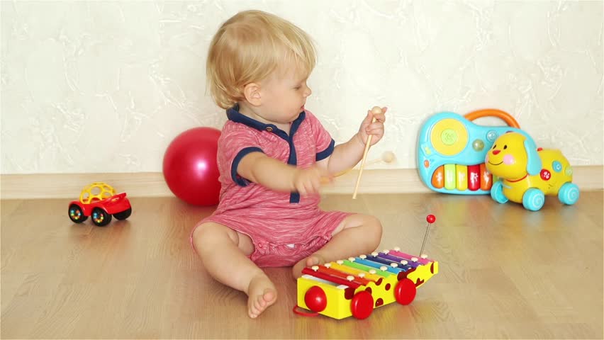 Hd00 14portrait Of A Beautiful Baby Boy On The Floor With Toys 1 5